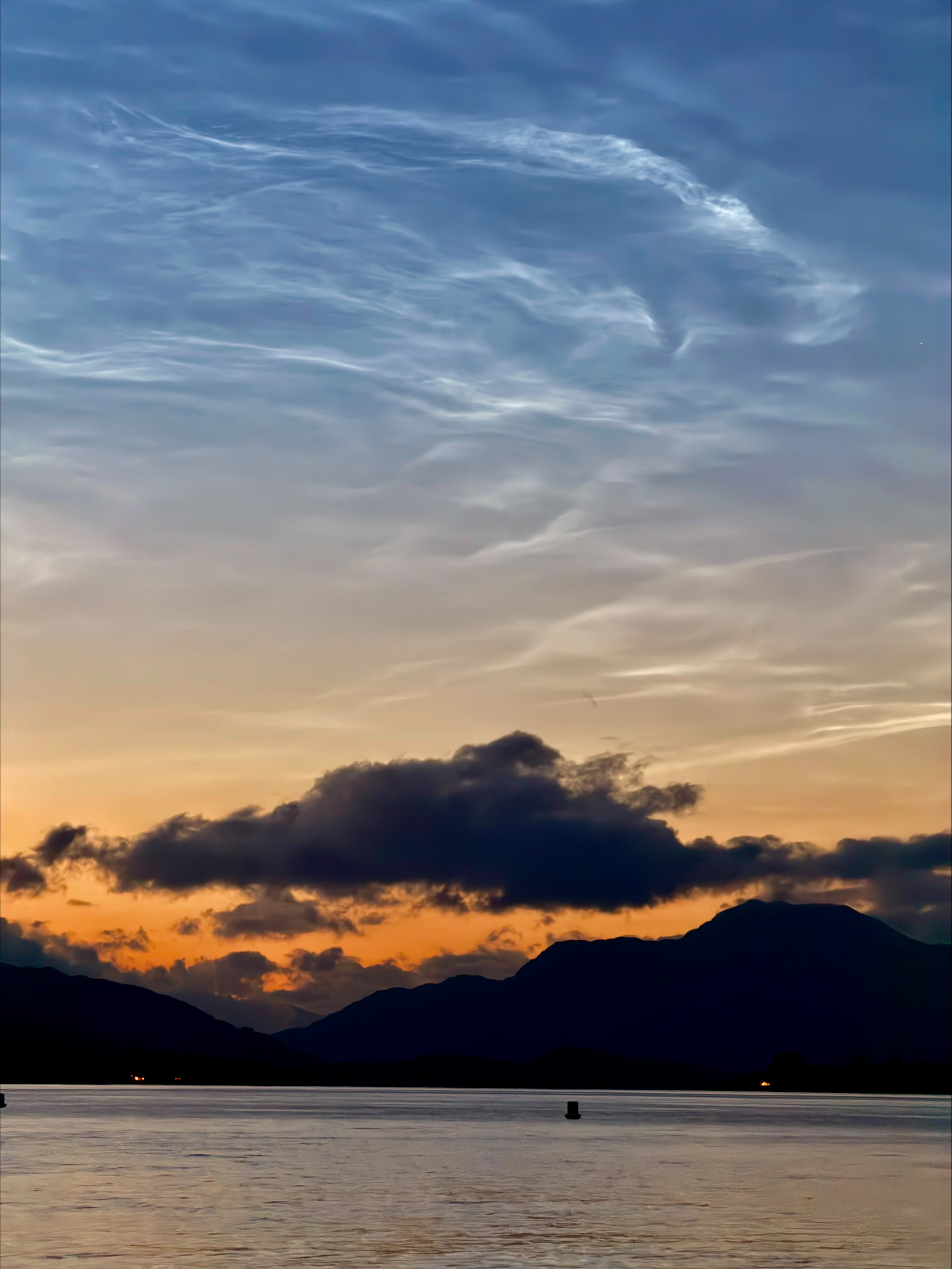 Photo of noctilucent clouds by James Place at Duck Bay, Loch Lomond
