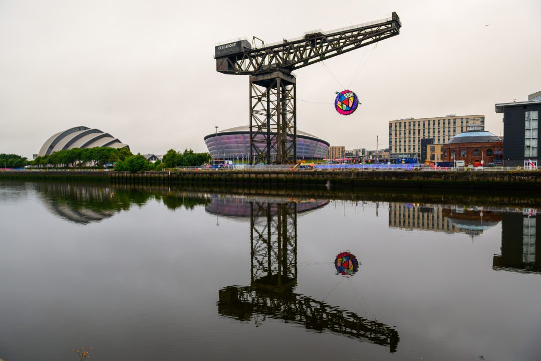 Charles Rennie Mackintosh-inspired Commonwealth Games artwork hung from Finnieston Crane