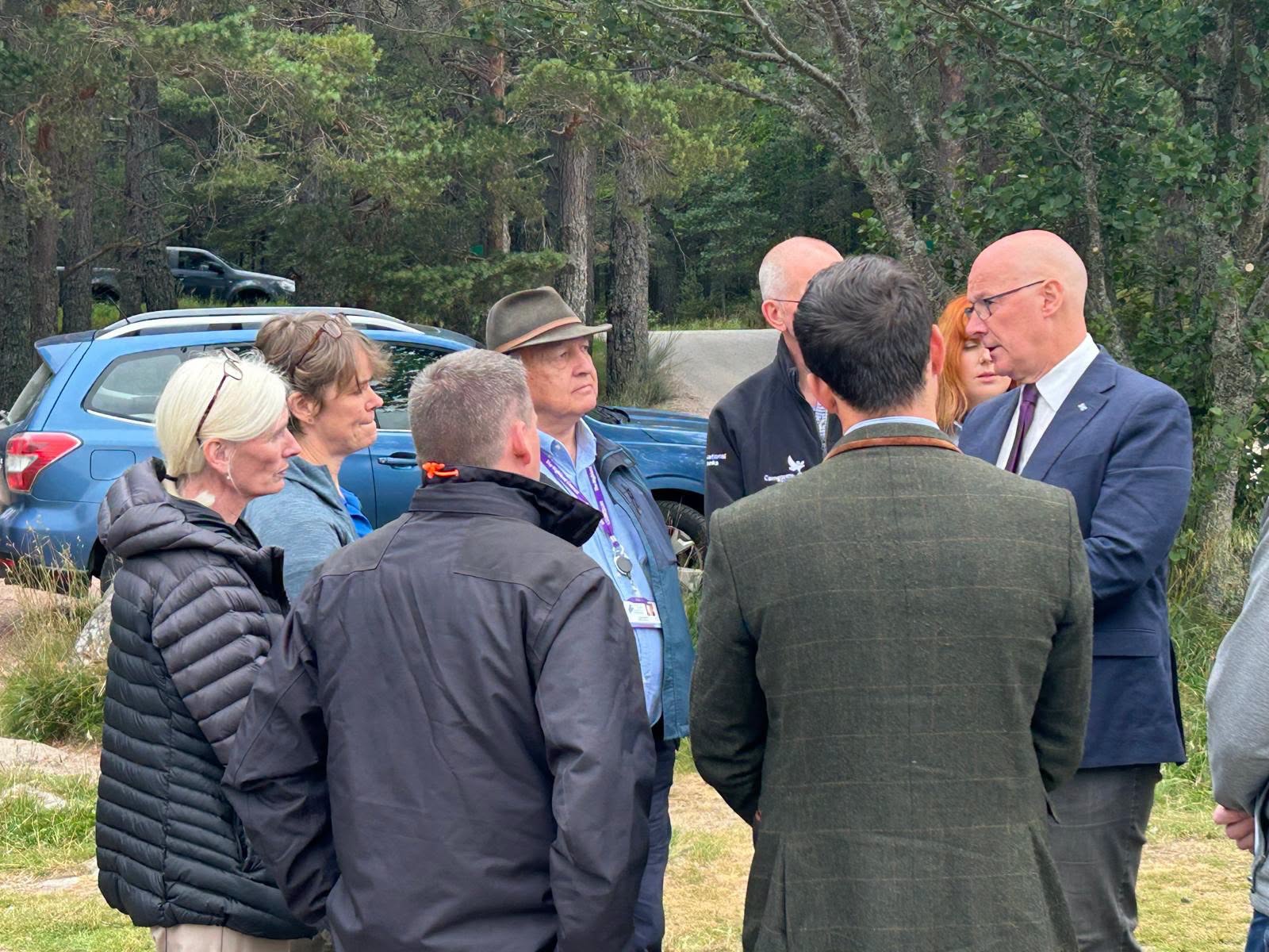 First Minister John Swinney visited the Cairngorms on Tuesday to meet firefighters and community leaders.