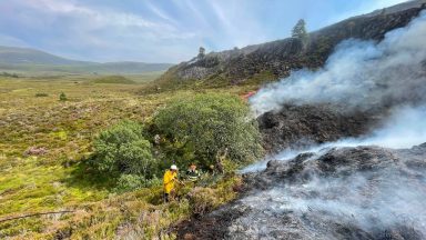 Cairngorms wildfire ‘largely surrounded’ after five-days