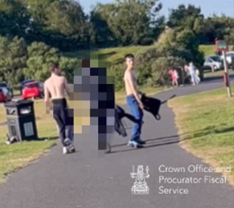 The three attackers walking away from the scene of Kayden Moy's murder.