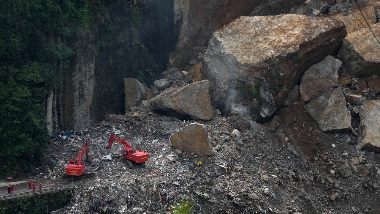 Rescuers in China search rubble for survivors of landslide that killed eight