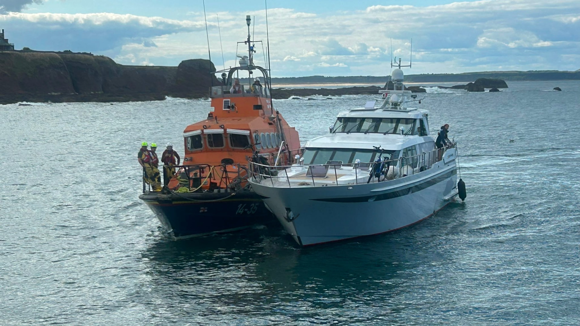 Family sailing around Britain rescued from yacht off Scots coast