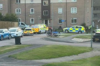 Man charged as residents forced to evacuate flats due to ‘disturbance’