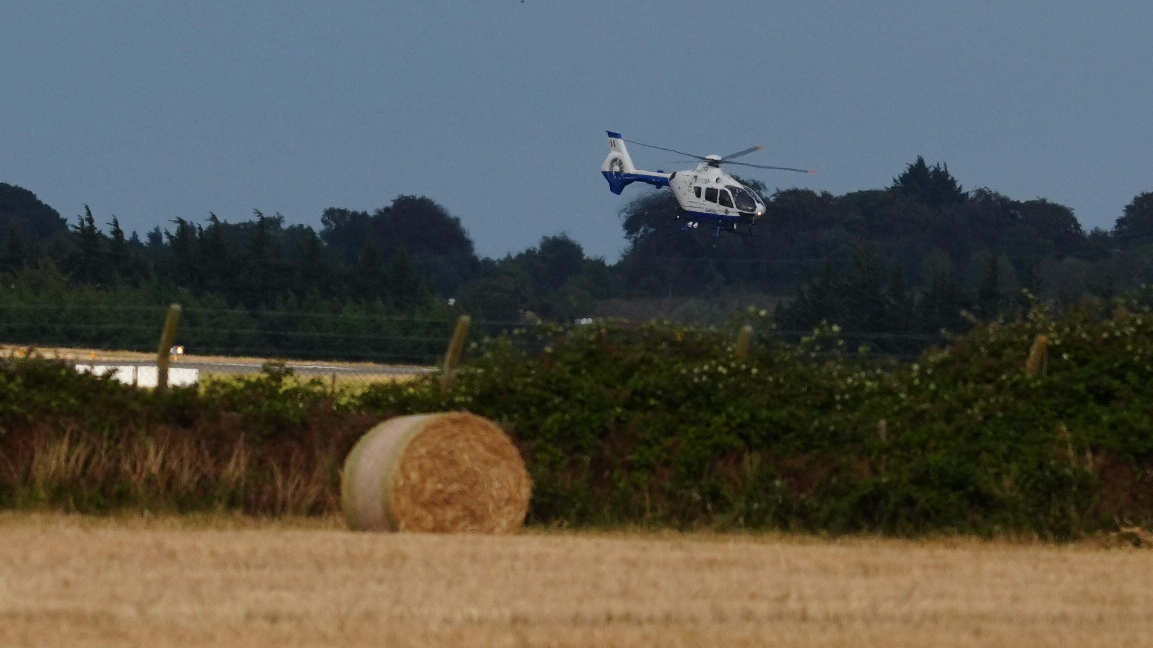 A Garda helicopter above Casement Aerodrome