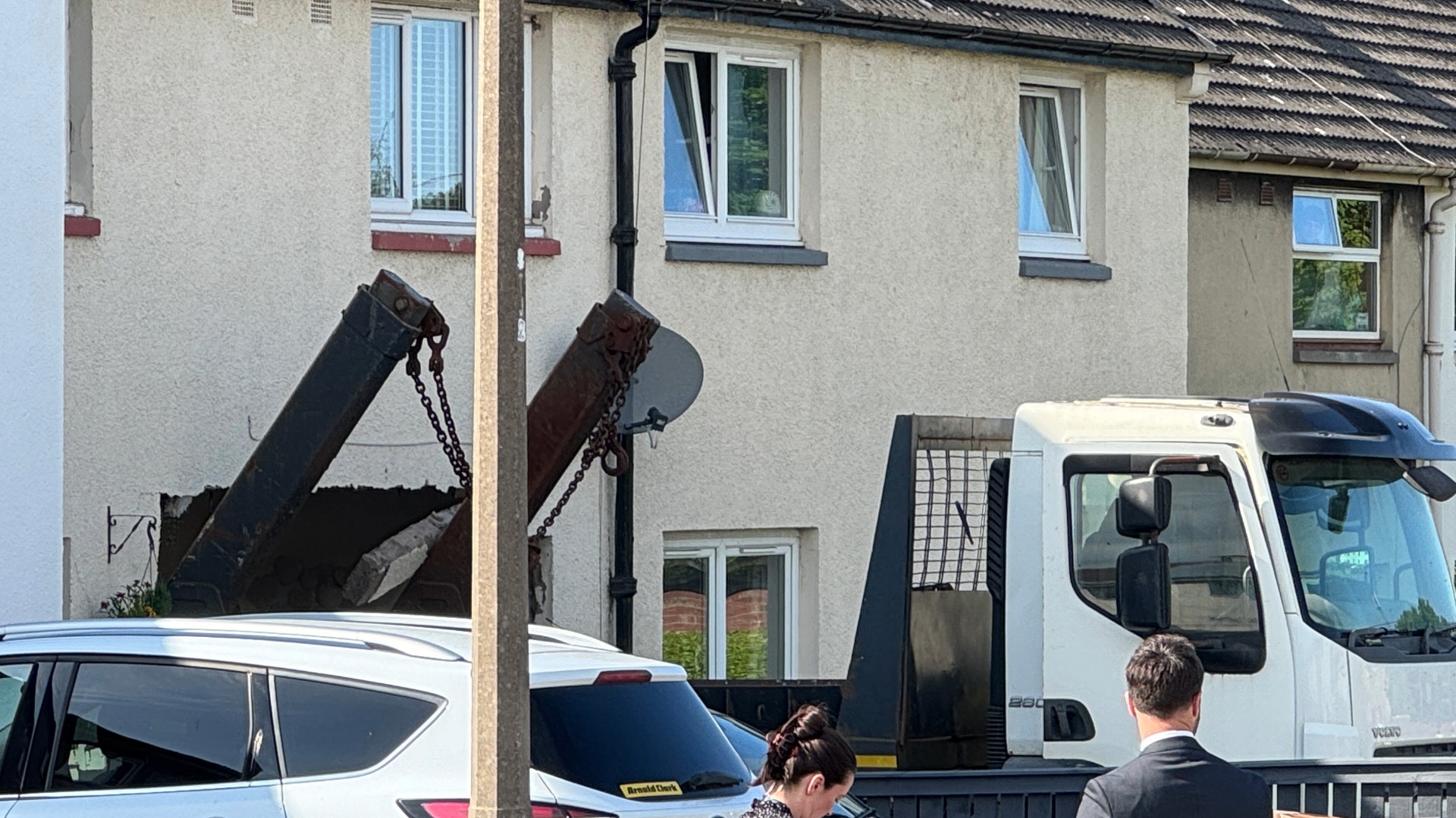 A skip lorry was driven into a home earlier this year