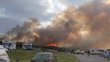 Fallen power line may have contributed to large grass fire that burned overnight in Moray