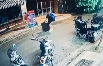 CCTV appears to show man carrying suitcase with murdered Scots woman inside