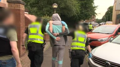 Police raid homes in Celtic title disorder crackdown as four arrested