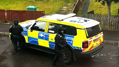 Man arrested and taken to hospital after armed police lock down street in Fife