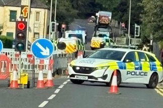 Road closed in both directions after pedestrian hit by car in Perth