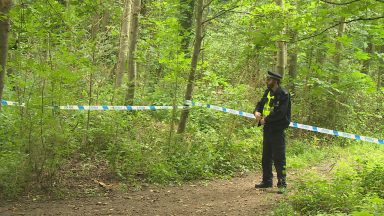 Police remain on scene after girl found dead in water in Gore Glen woodland park