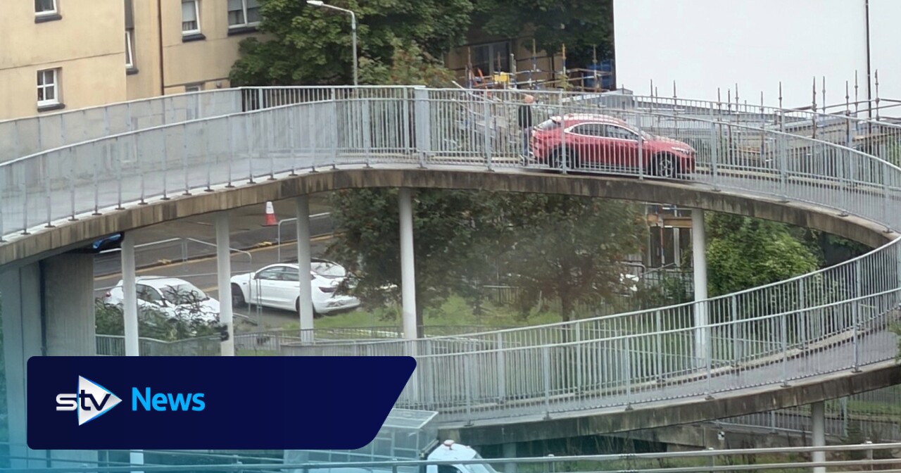 Car spotted driving down pedestrian bridge over the M8 motorway in Glasgow