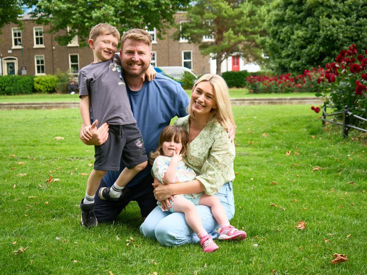 Emma with her partner and children