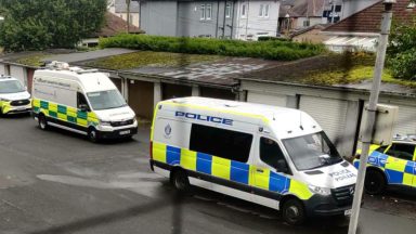 Manhunt launched near Glasgow flat block for suspect with ‘bladed weapon’
