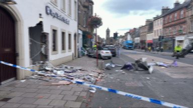 Cash machines ripped from wall after stolen telehandler rams into Peebles bank