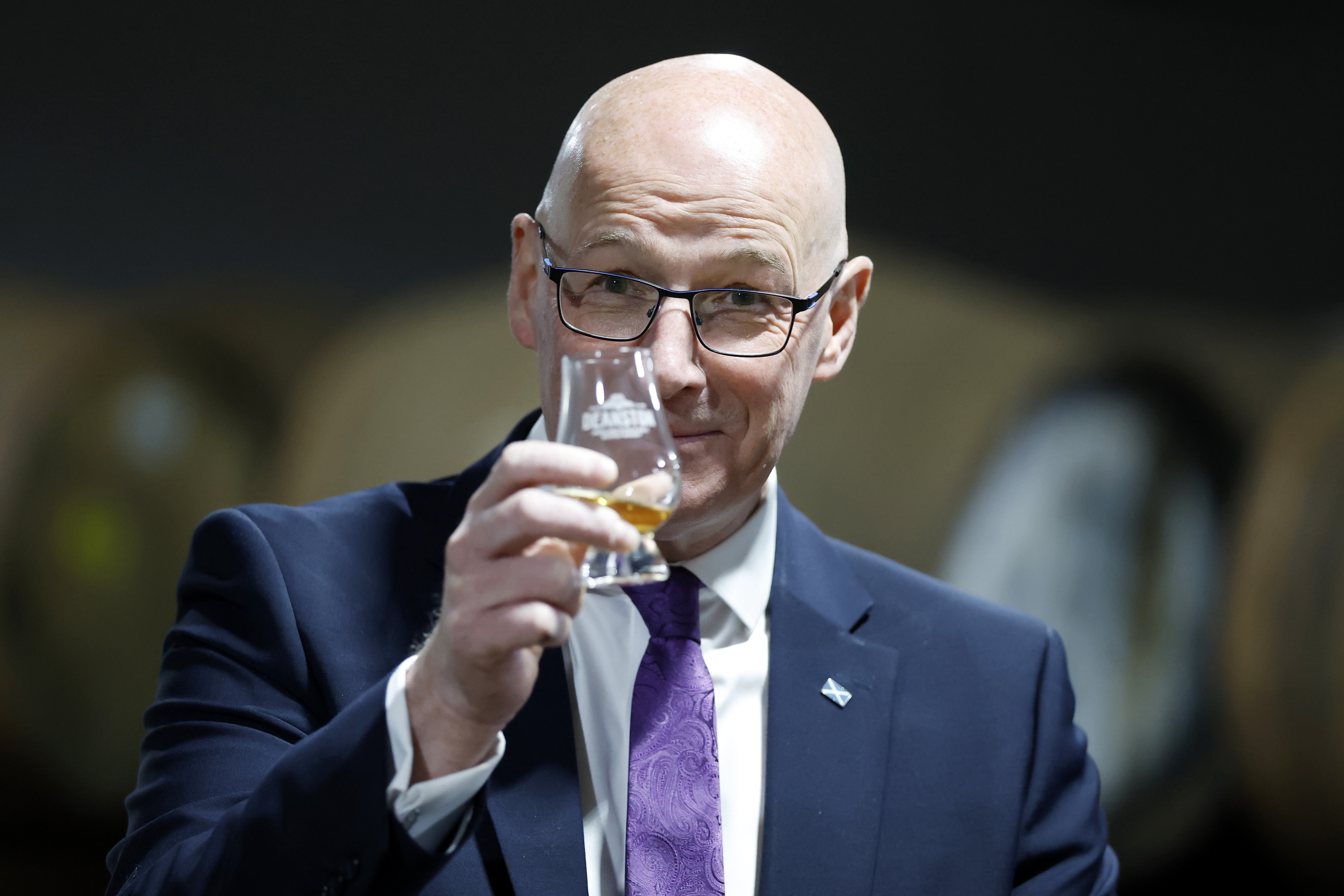 First Minister John Swinney described the lifting of US tariffs on Scotch whisky as a 'good day for Scotland'.