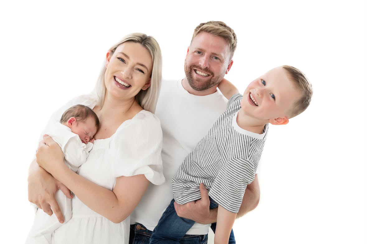 Emma with her family