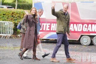 William and Kate all smiles as they arrive on Bute