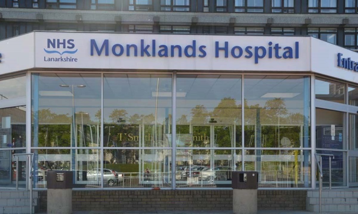 Driver charged after car crashes into hospital building