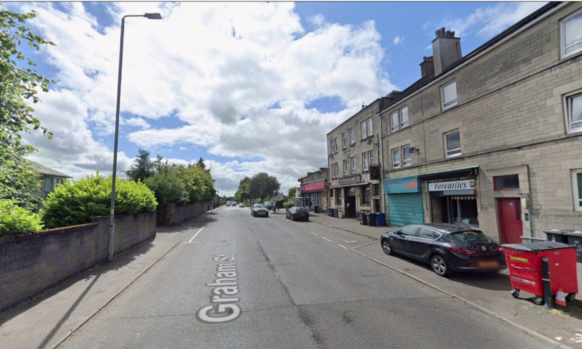 Man in hospital after falling from window ‘trying to escape from armed suspects’