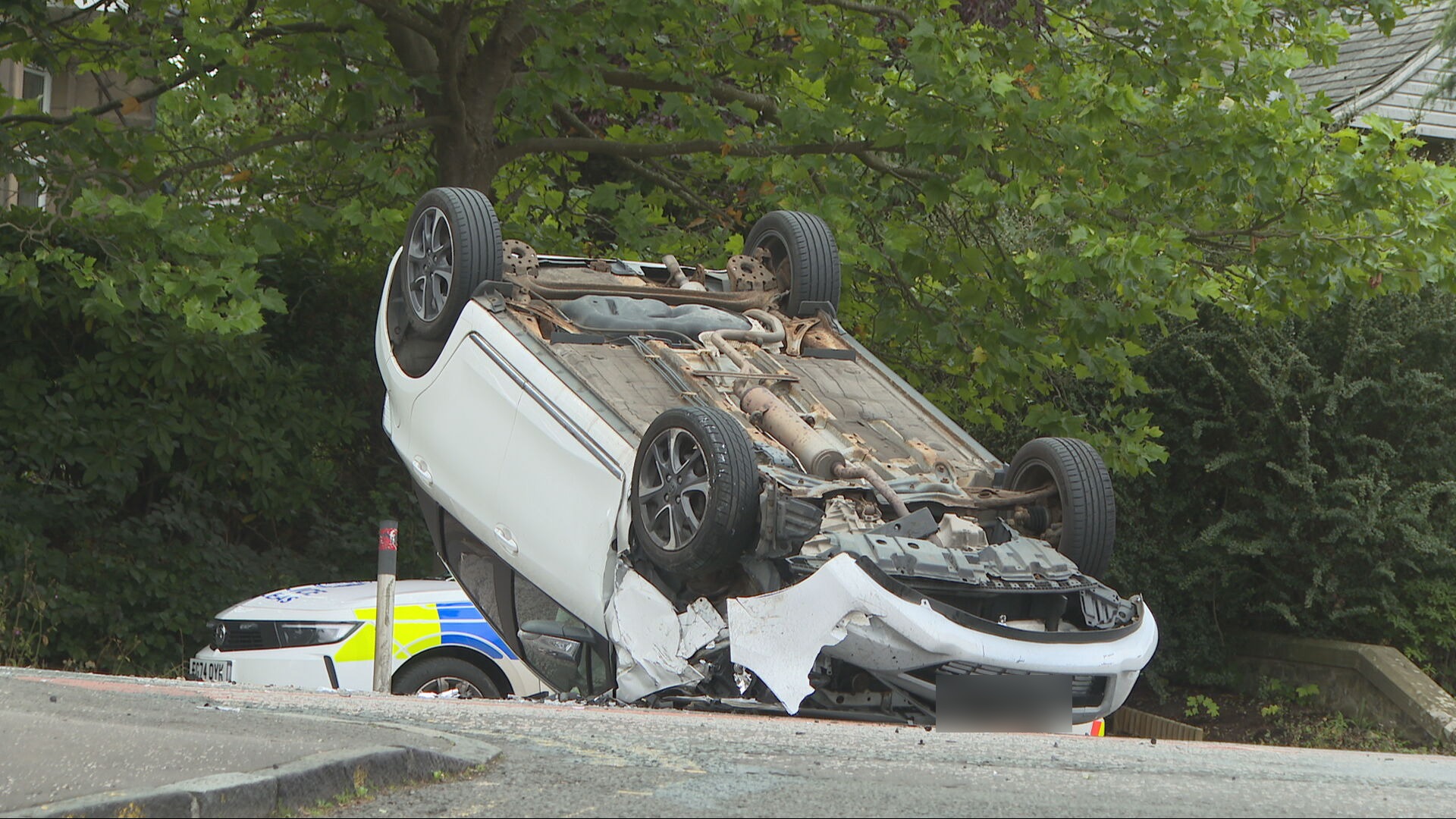 Car flipped onto the roof on Orchard Road, Edinburgh