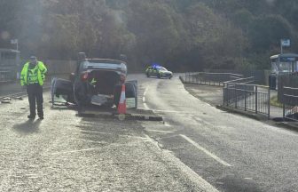 Car flipped onto roof after crash in Greenock