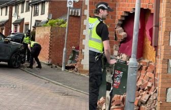 Car crashes into house in Edinburgh as police launch investigation