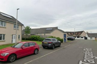 Woman charged after police descend on property in Fife