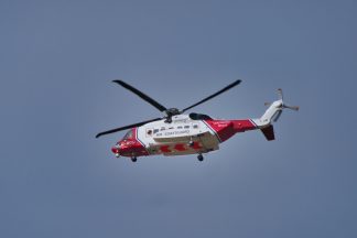 Body of man found amid major search for missing fishing boat with three aboard