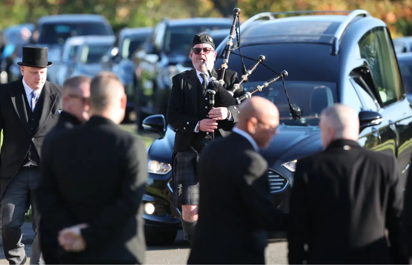 A piper led the cortege