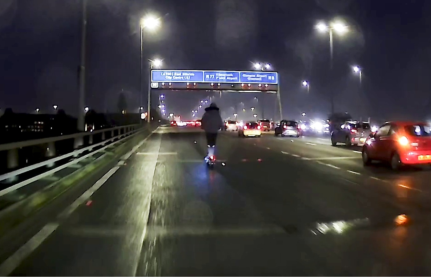 Dashcam footage appears to show a figure zooming across lanes on the M8 Kingston Bridge