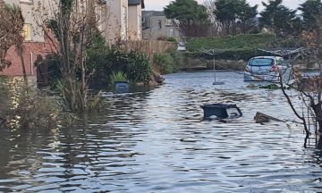 Firefighters pump away ‘millions of litres of floodwater’ surrounding care home