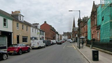 Two pedestrians taken to hospital after being struck by van in Dumfries