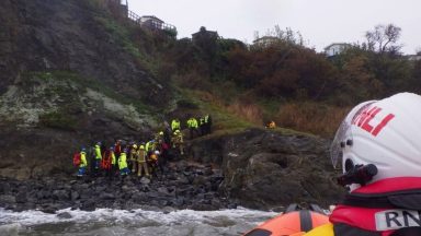 Man and three dogs rescued from rising tide after fall along Fife shoreline