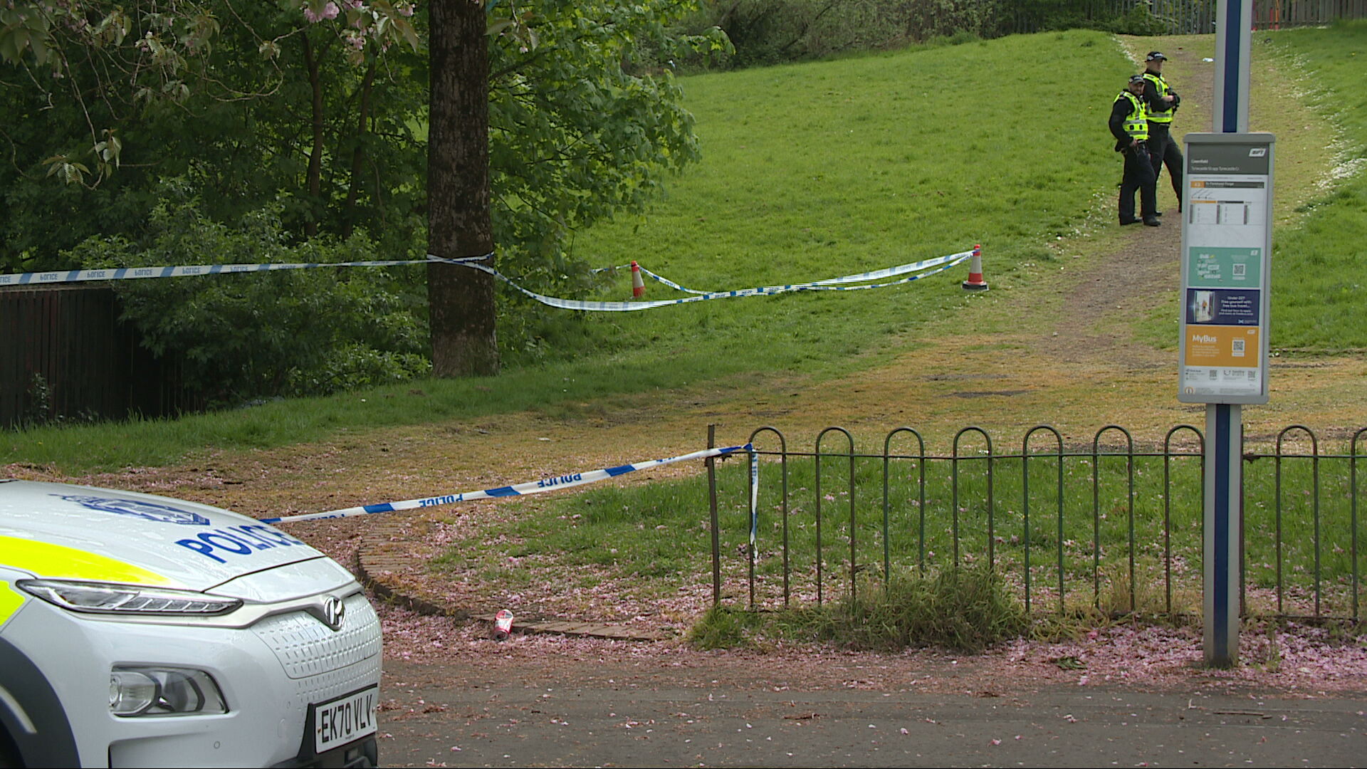 Armed police searched the scene