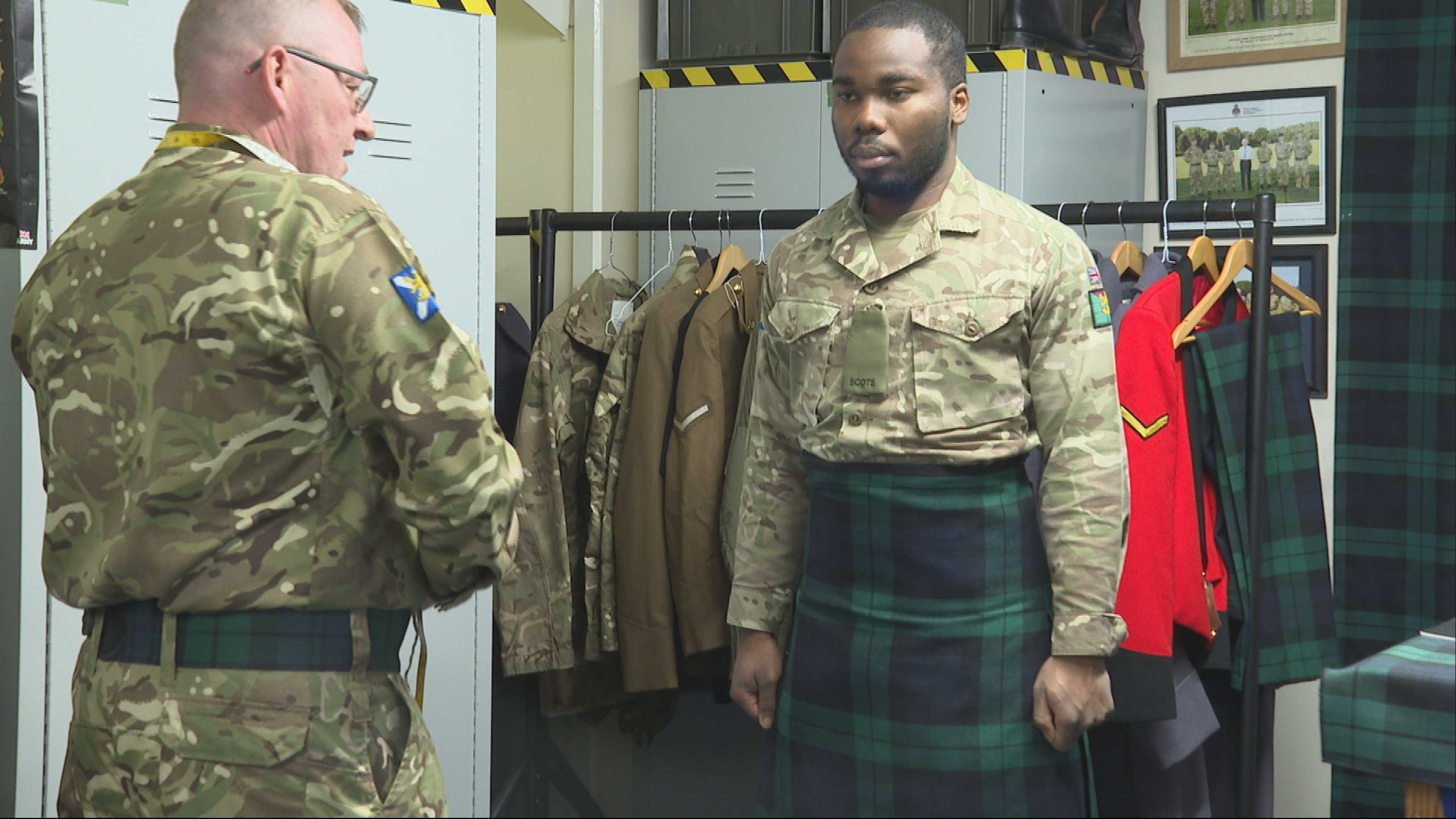 Sgt Couper measures up a soldier