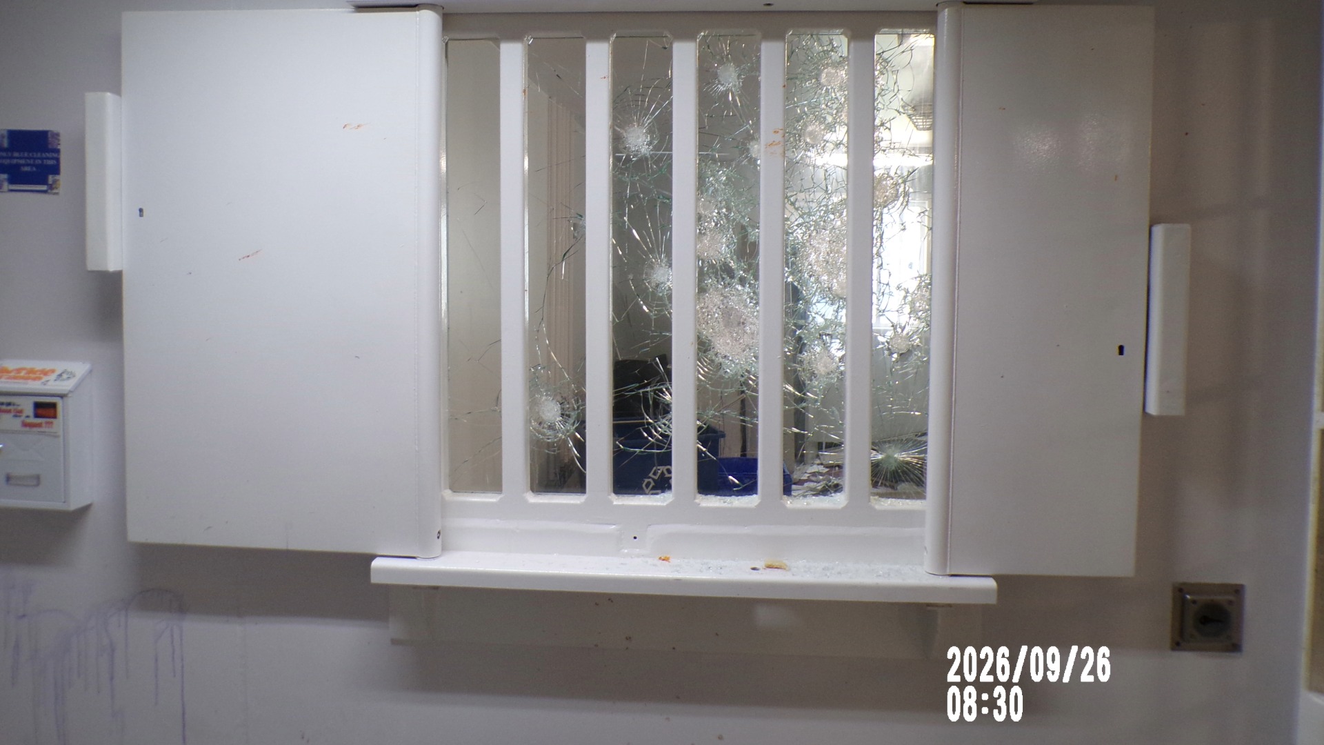 Glass windows were smashed during the riot.