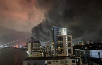Fire crews battle Glasgow scrapyard blaze as residents urged to close windows and doors